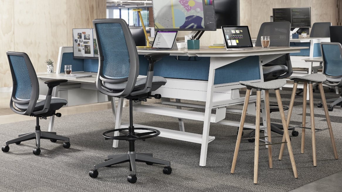 Height adjustable desk and Amia stool